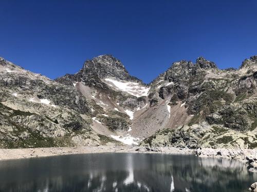 The highest of the Ibones de Arriel with Pico Palas behind