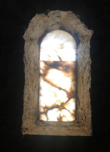 Alabaster window which are common in the Romanesque buildings of the area