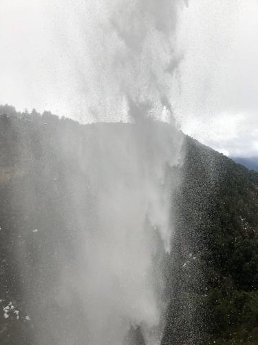 Behind the waterfall
