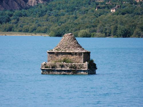The semi-submerged church tower in the Embalse Mediano